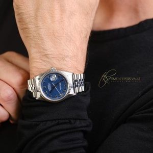 Rolex Mens Datejust SS 36mm Blue Roman Dial Engine Turned Bezel Watch